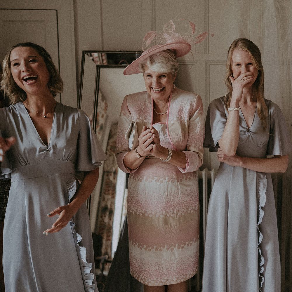 Bridesmaids see bride for the first time and become emotional