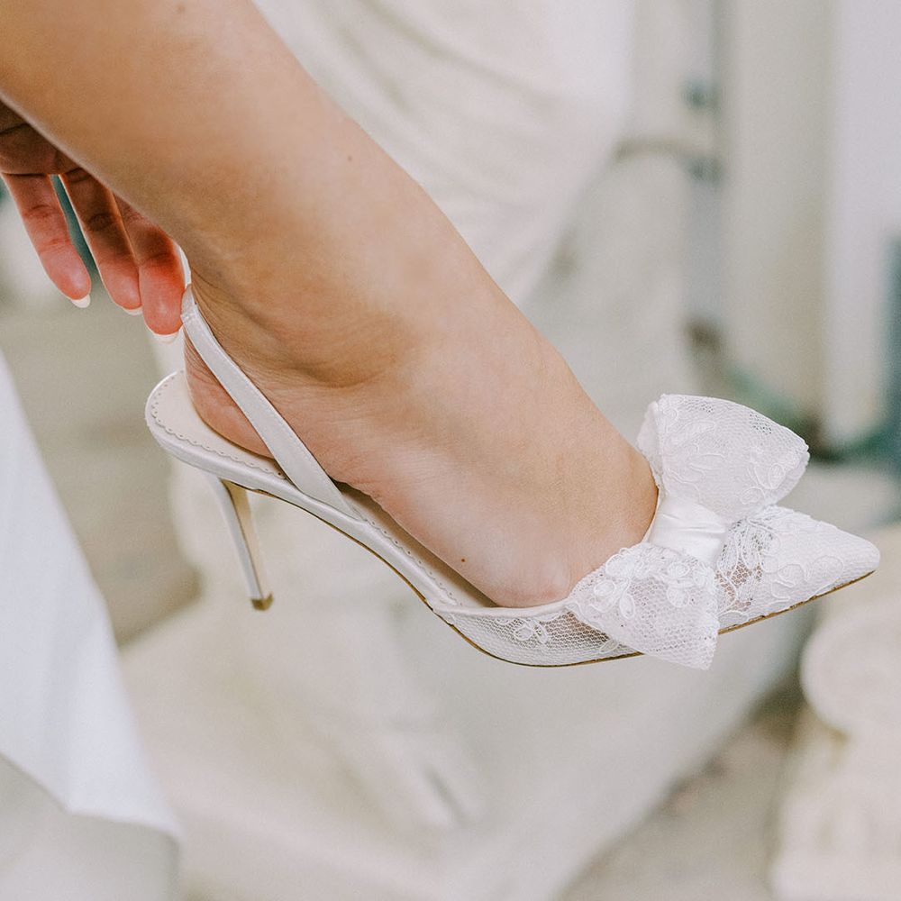 Stiletto slingback wedding shoes with sheer lace and bow