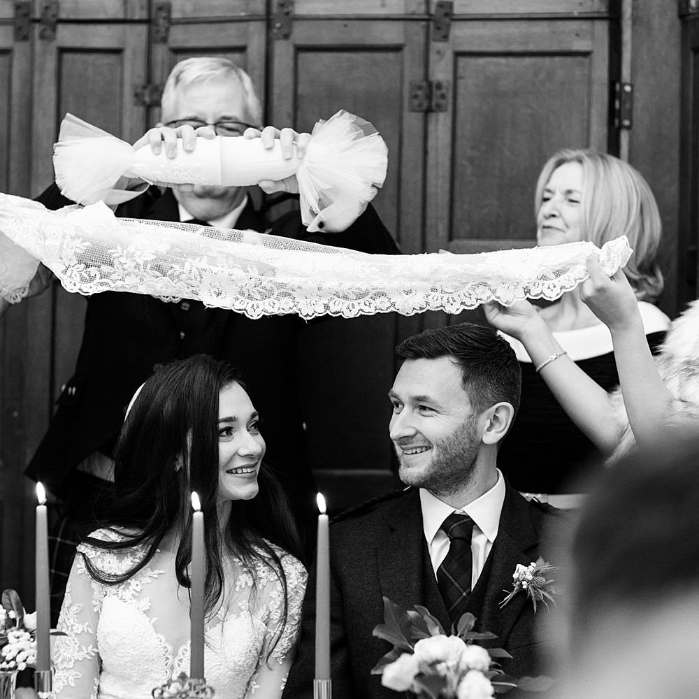 Bride & groom during wedding reception complete with Persian wedding traditions 