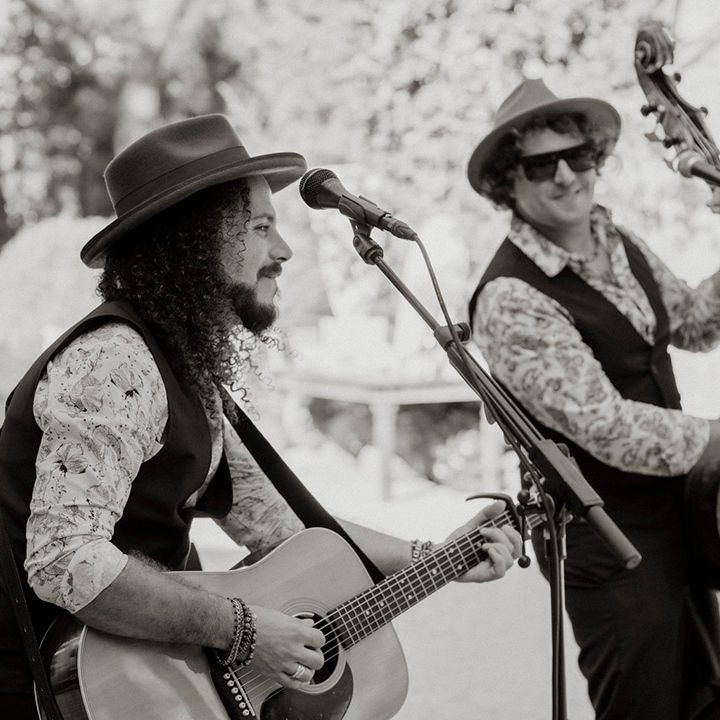 Wedding band performs at outdoor wedding celebrations 