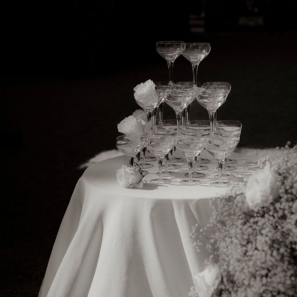 Champagne tower decoration for luxe dinner party wedding 