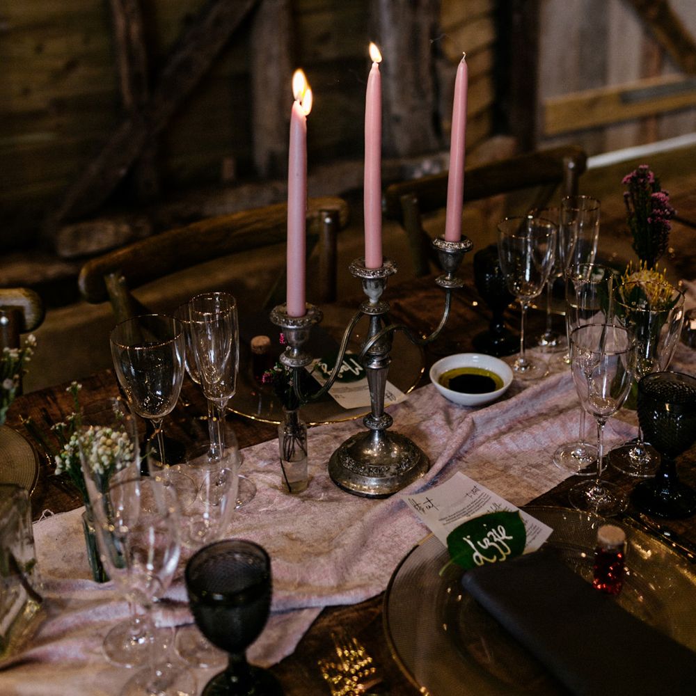 silver candlestick and taper candle wedding decor