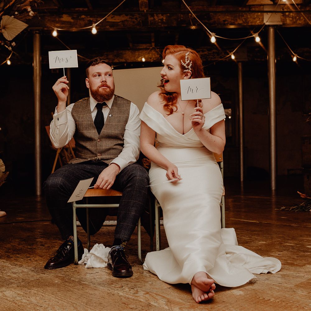 Bride and groom play Mr & Mrs at their micro wedding 