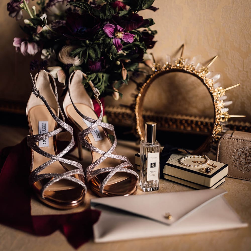 Sparkly Jimmy Choo wedding shoes with Jo Malone London wedding scent with crystal bridal crown 