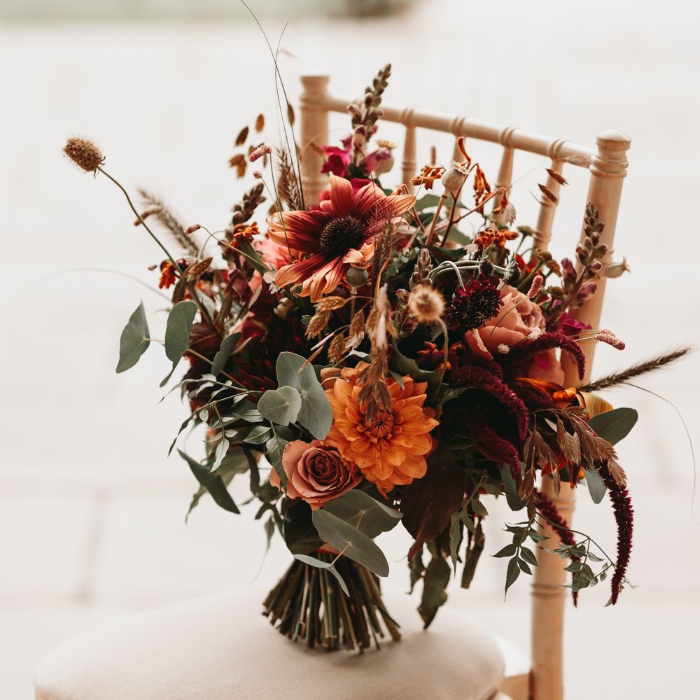 Autumn wedding bouquet with orange wedding flowers