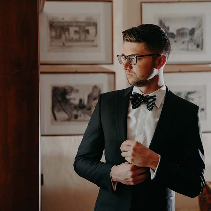 Groom wears black tie for outdoor Italian wedding  | Royal Studio