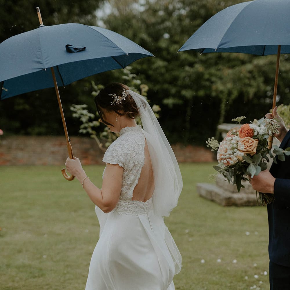 Rosa Clara wedding dress with lace detail and open back