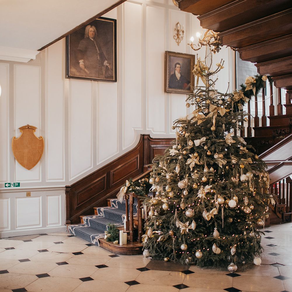 Christmas tree complete with gold decor 