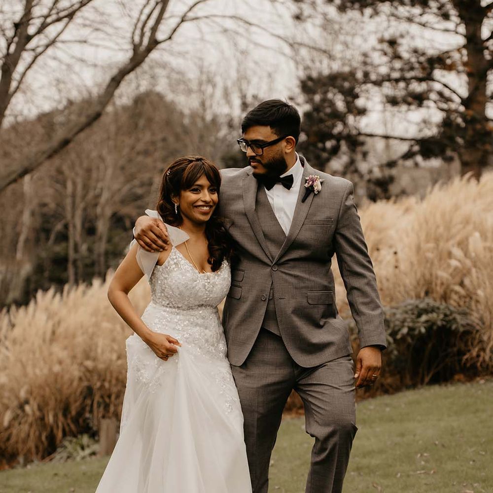 Bride (before mint green saree change) and groom walking around the grounds of The Petersham Hotel in Richmond 