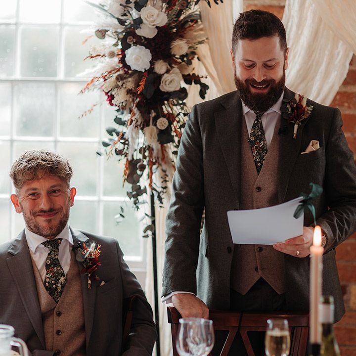 Groom reads wedding speech at the wedding breakfast 
