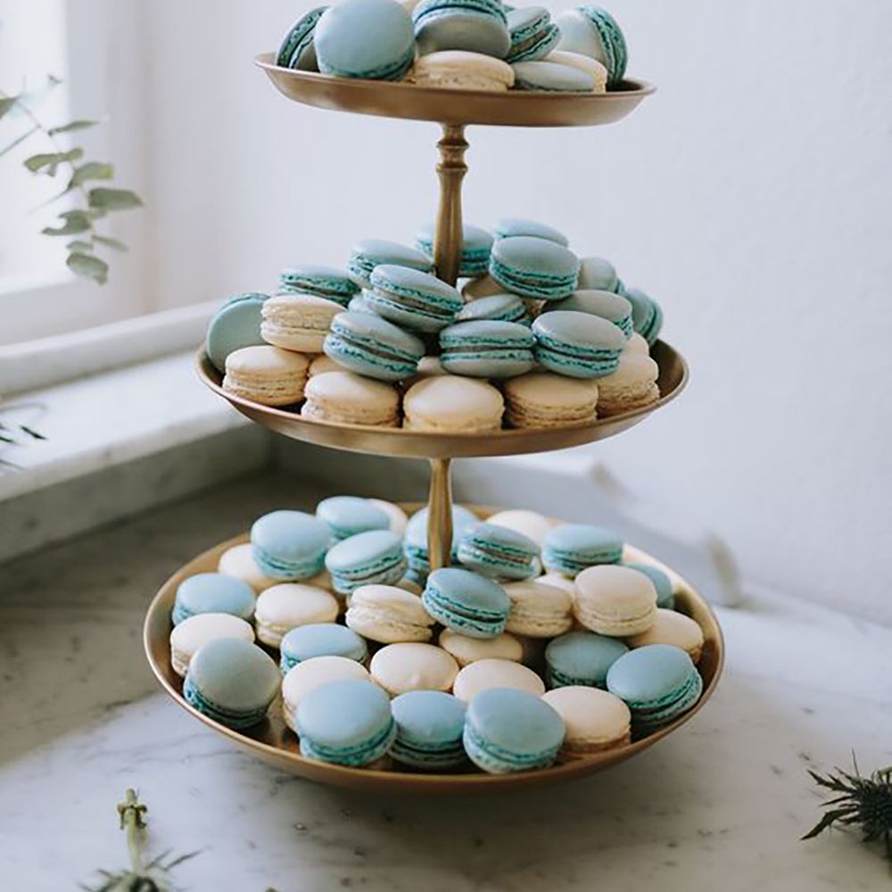 Blue macaroons presented on large stand by Thomas Steibl Photography 