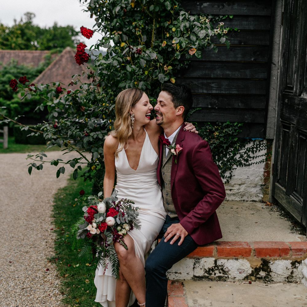 Stylish bride and groom at micro wedding