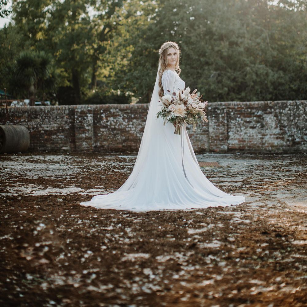 Stunning bridal photography in country barn garden 