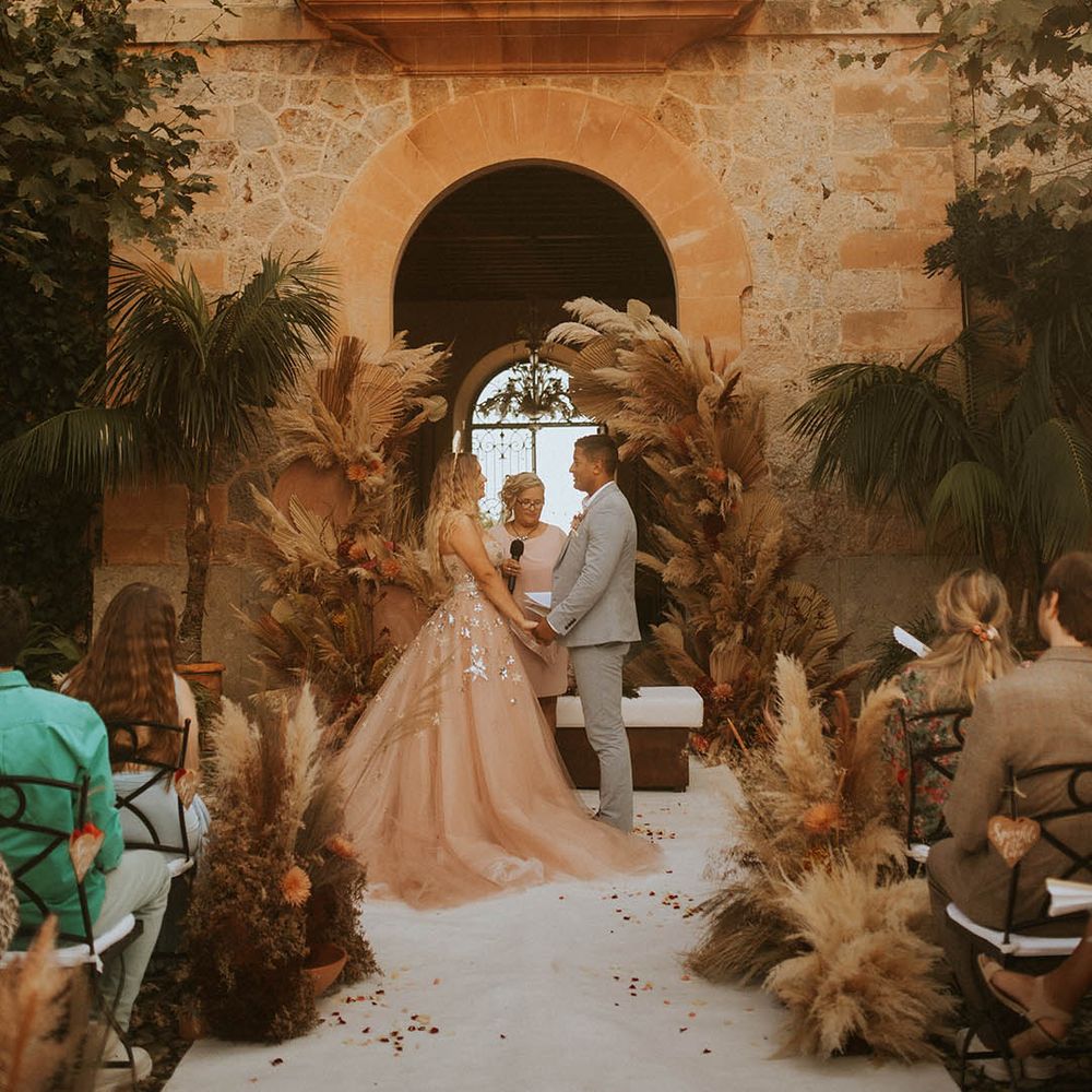 Bride & groom during outdoor wedding ceremony in Mallorca