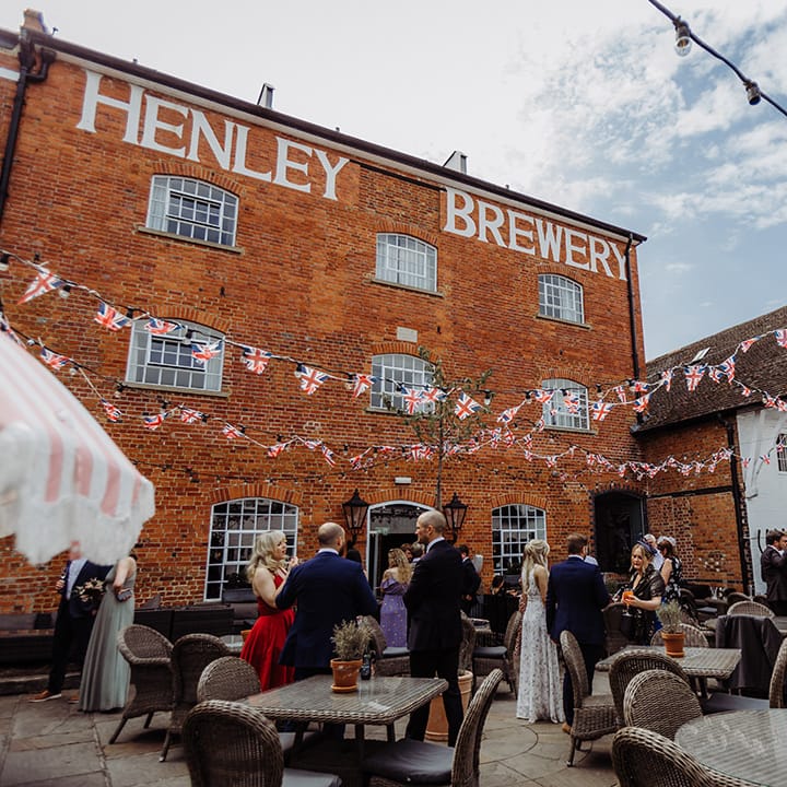 Henley Brewery wedding venue decorated with Union Jack flags