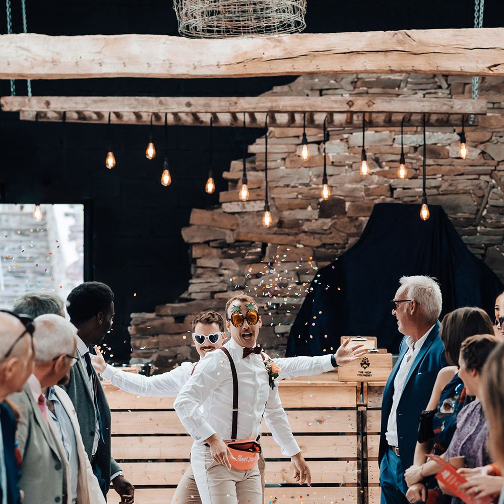 Adult 'flower dudes' with personalised bum bags full of confetti 