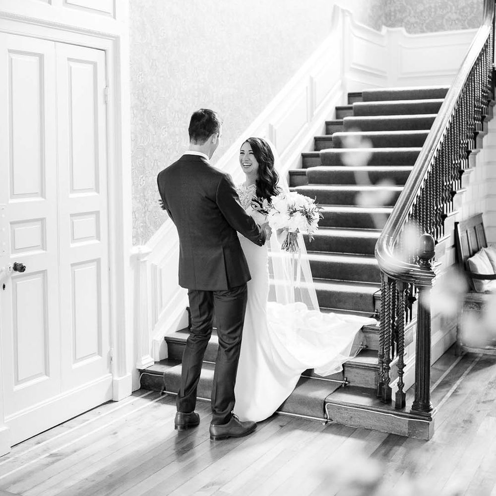 Bride and groom first look moment at Ardington House wedding venue 
