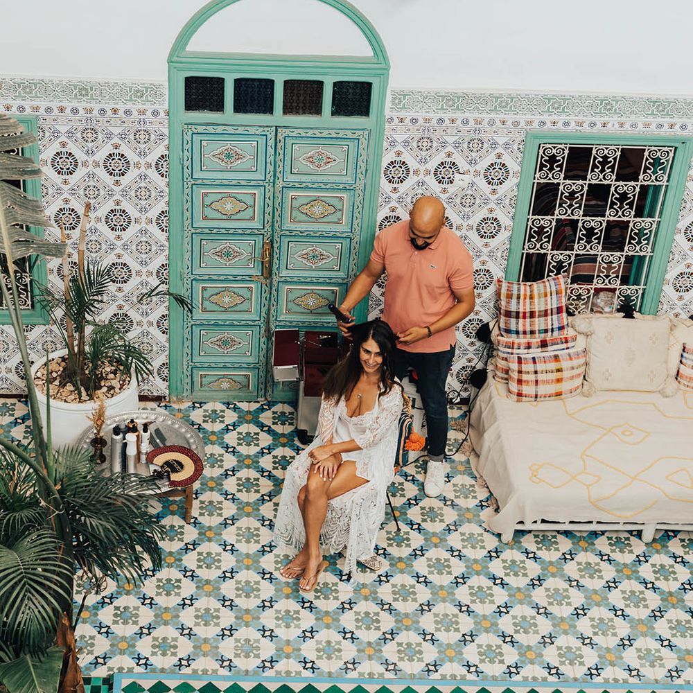 The bride gets her makeup done for her wedding day 