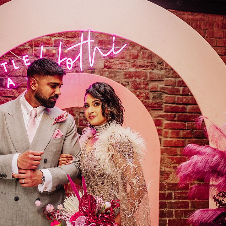 bride-and-groom-at-pink-south-asian-wedding