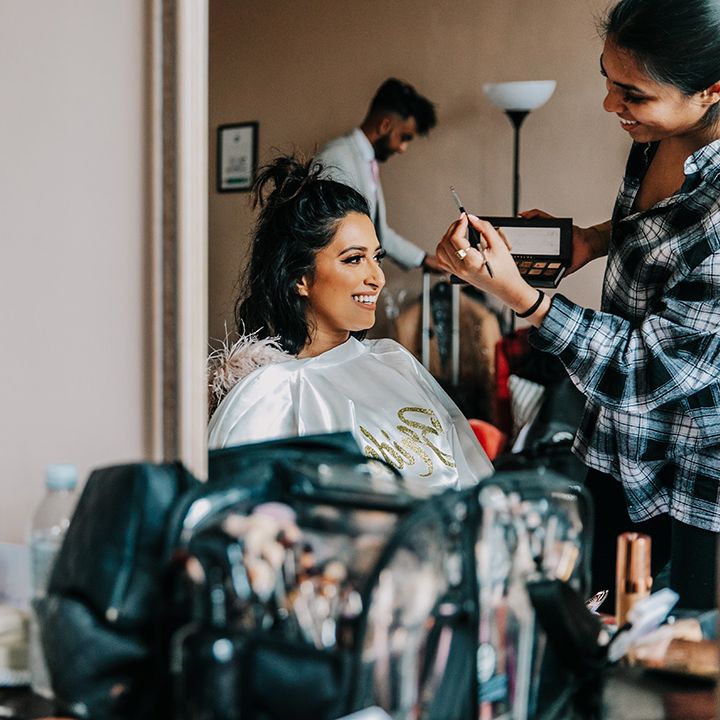 bride-gets-wedding-makeup-done-for-wedding-day