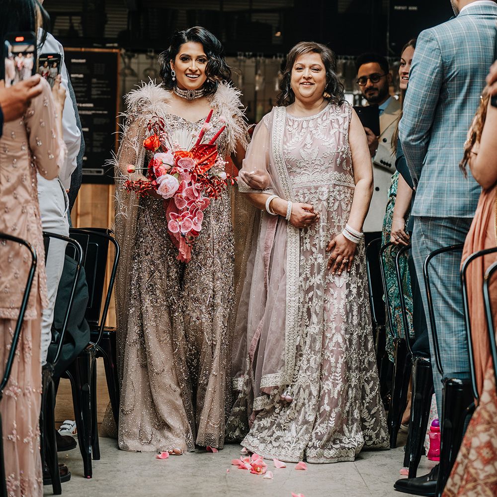 bride-walks-down-aisle-with-mother-of-the-bride