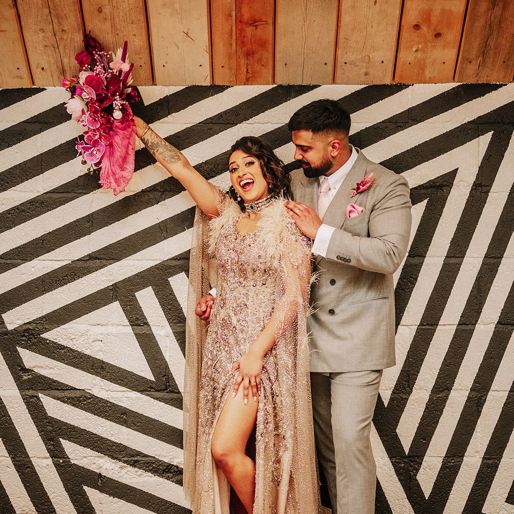 groom-in-light-grey-suit-with-bride-in-sparkly-wedding-dress