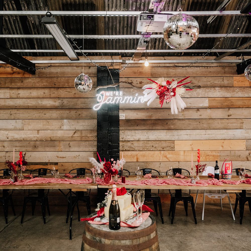 personalised-wedding-neon-sign-with-disco-balls-and-dried-flowers