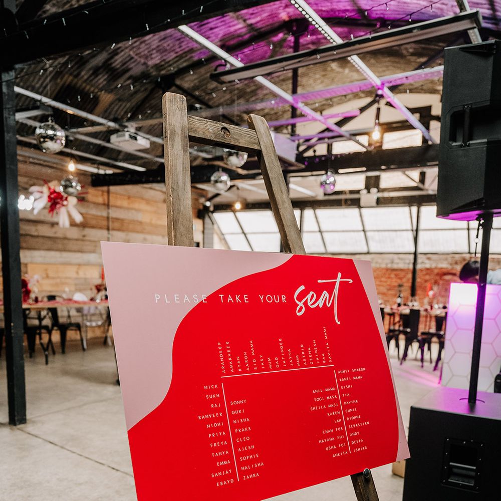 pink-and-red-wedding-seating-chart-sign
