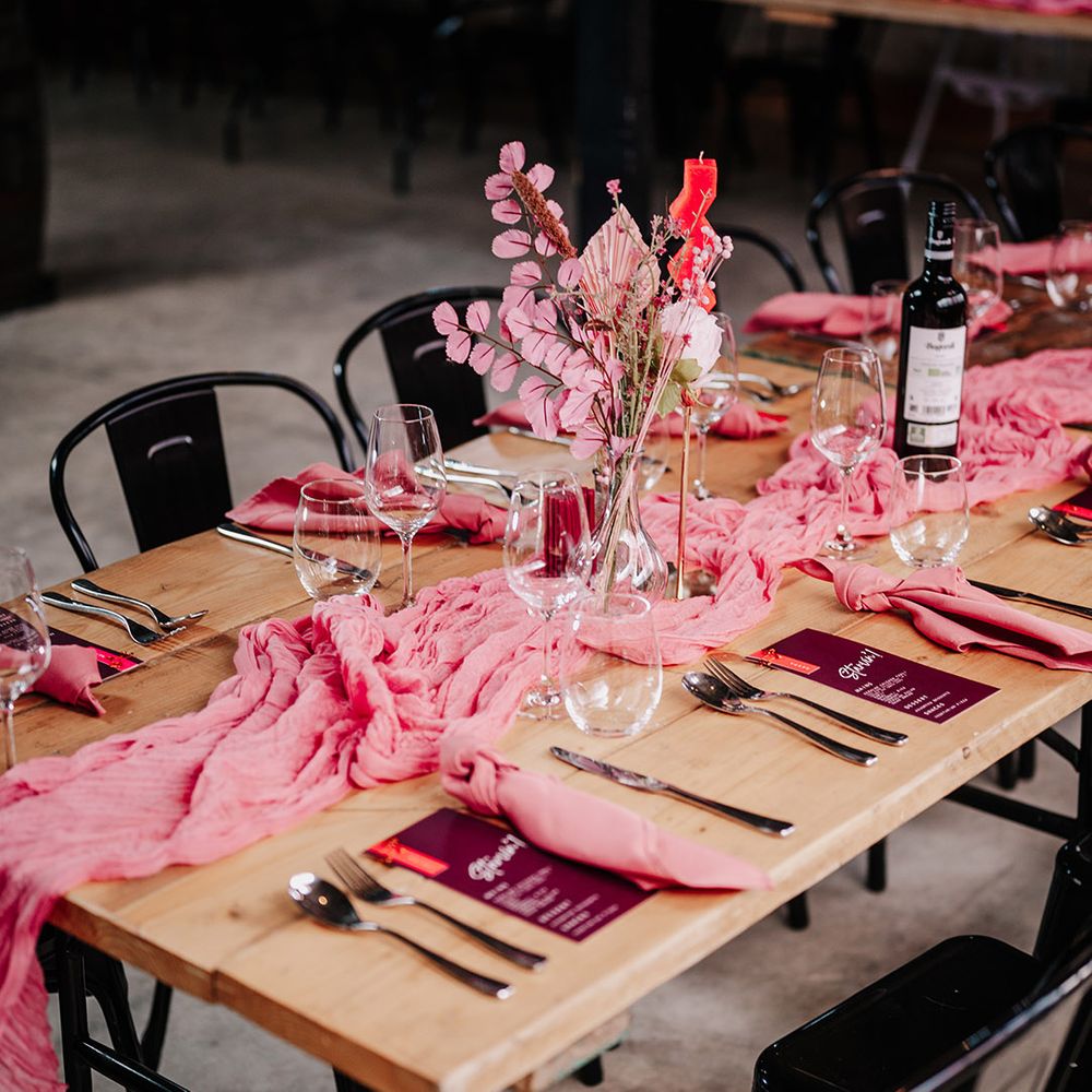 pink-wedding-table-runner-and-dyed-pink-flowers