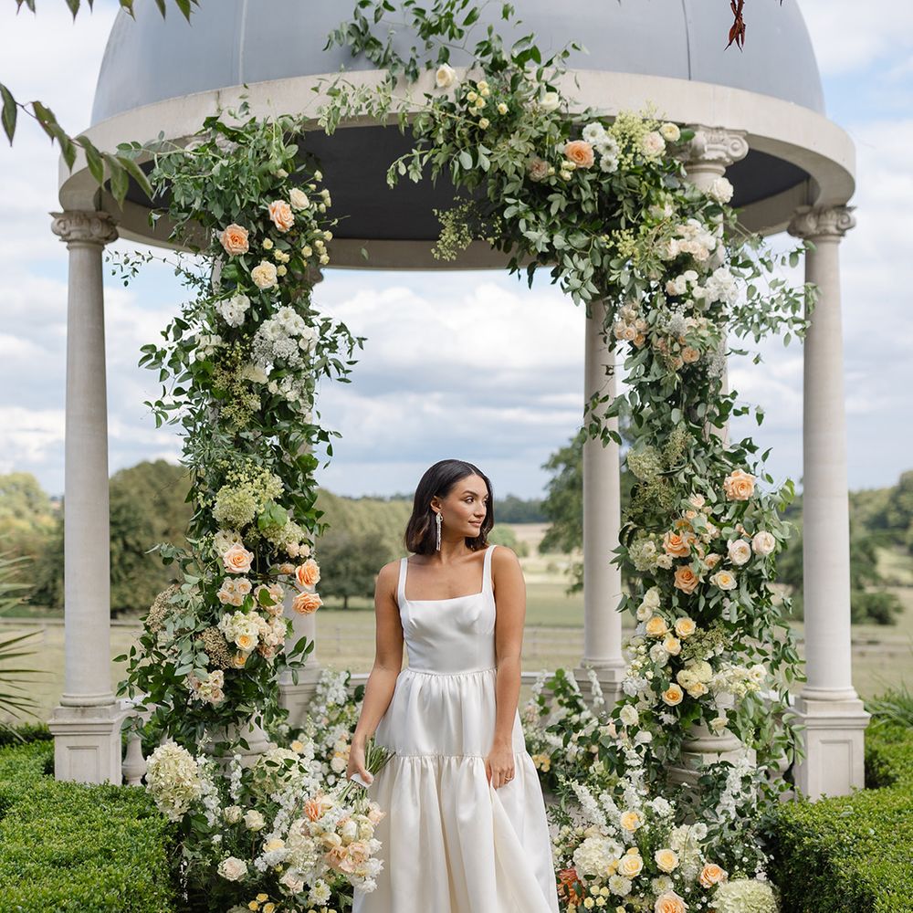 bride-in-square-neck-wedding-dress-with-colourful-yellow-wedding-flowers