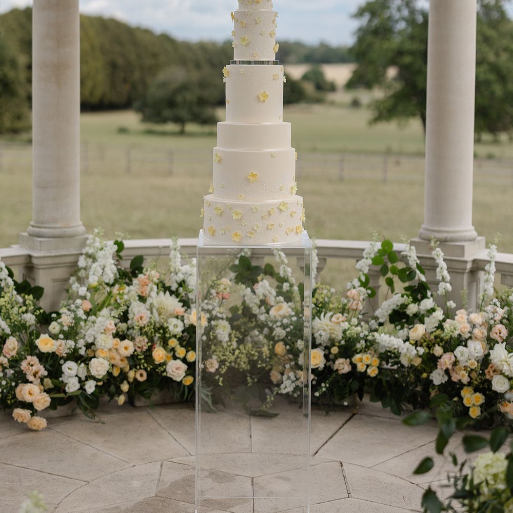 luxury-epic-white-wedding-cake-with-yellow-flowers