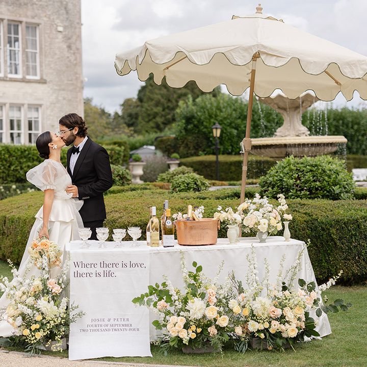 outdoor-wedding-bar-with-fabric-banner-sign