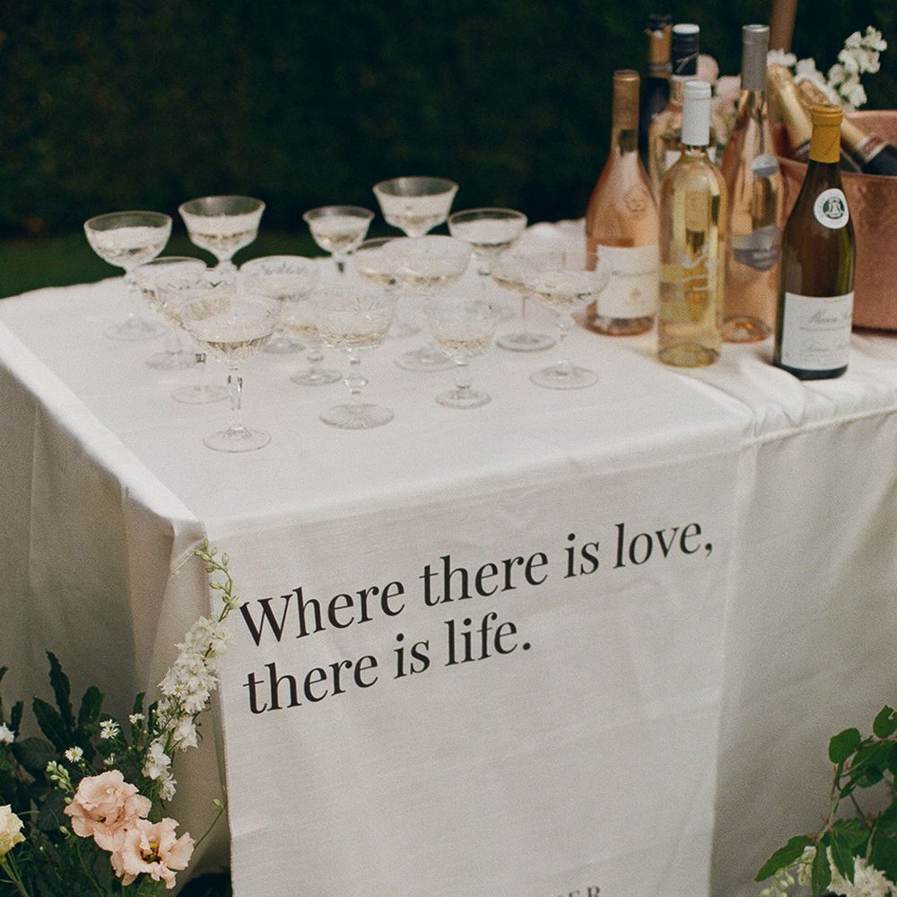 wedding-cocktails-with-minimalist-wedding-fabric-signage