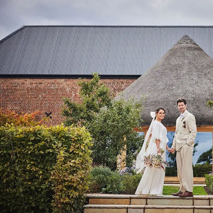 brickhouse vineyard wedding venue with couple outside venue