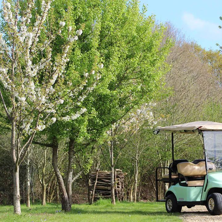 pinkmead estate vineyard wedding venue lawn with golf buggy