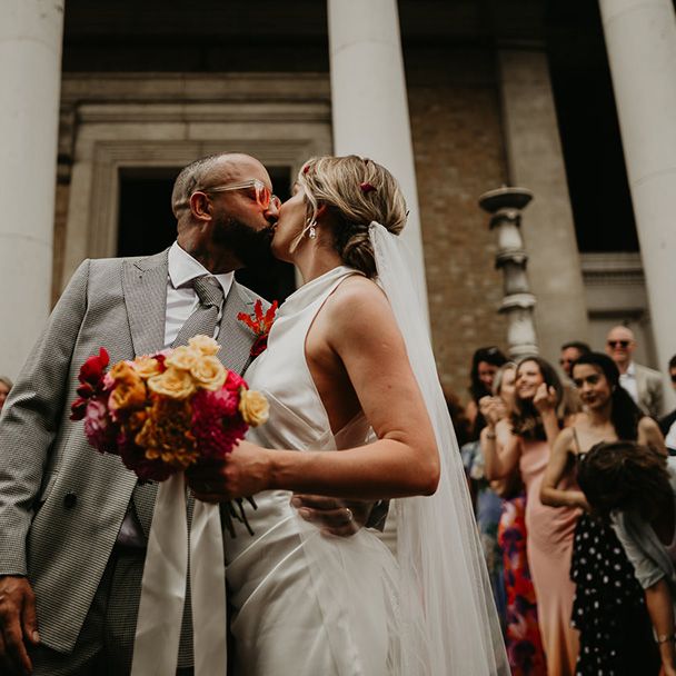 bride-and-groom-kiss-at-london-wedding