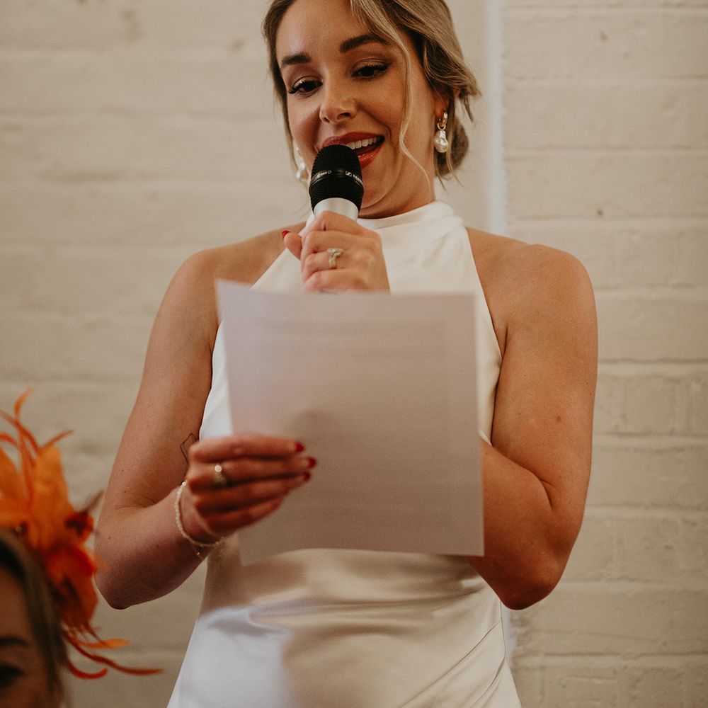 bride-reading-out-bridal-speech