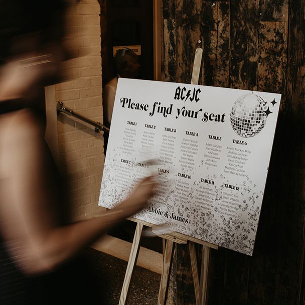 disco-music-wedding-table-plan-signage