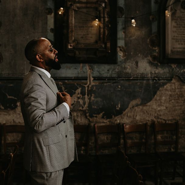 groom-in-grey-wedding-suit-and-sunglasses-at-asylum-chapel-wedding