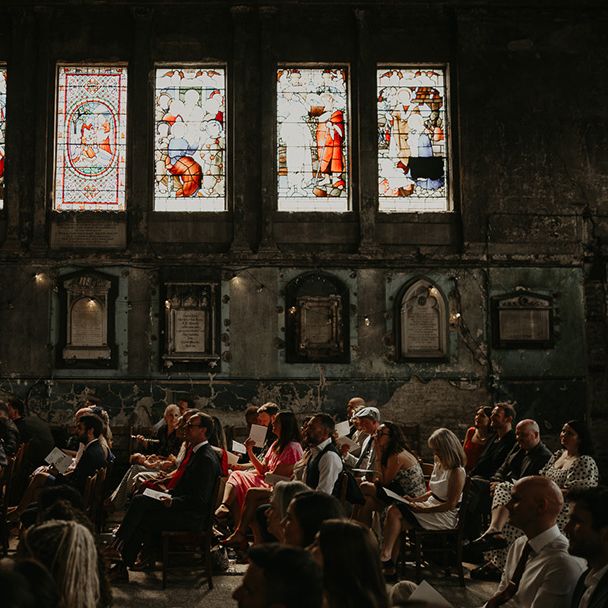 wedding-guests-seated-for-wedding-ceremony-at-asylum-chapel