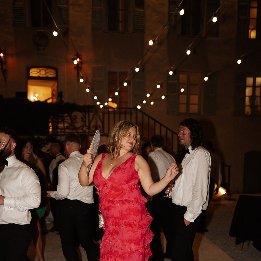wedding-guest-wearing-red-ruffle-wedding-guest-dress