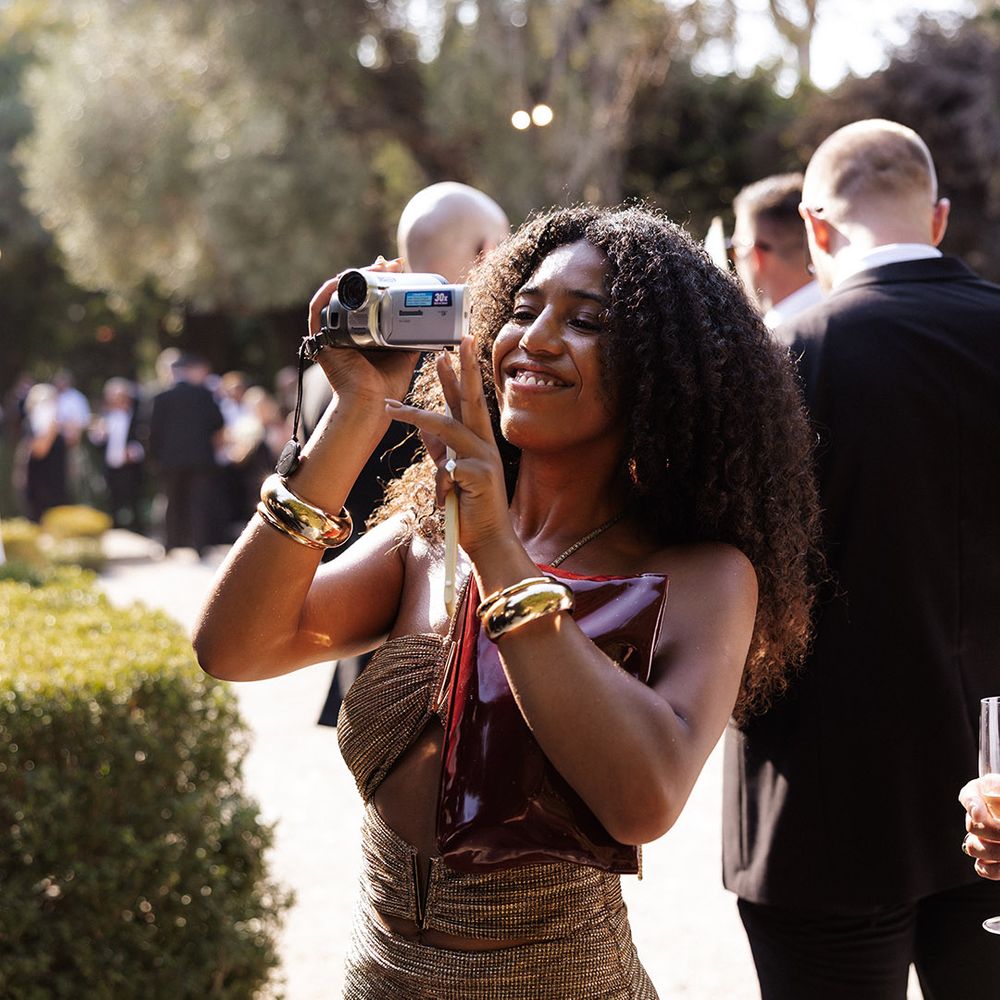wedding-guest-with-video-camera