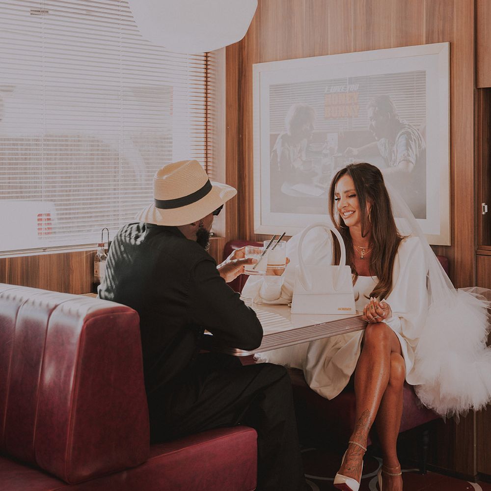 bride-and-groom-at-diner-for-elopement-wedding