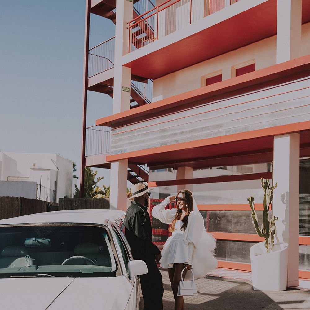 bride-and-groom-at-limousine-wedding-car