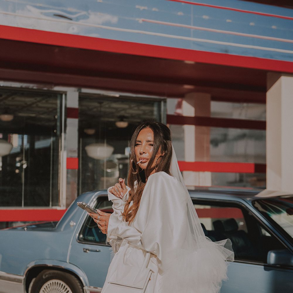 bride-in-cupid-blue-bridal-puff-sleeve-wedding-dress-with-ruffle-veil