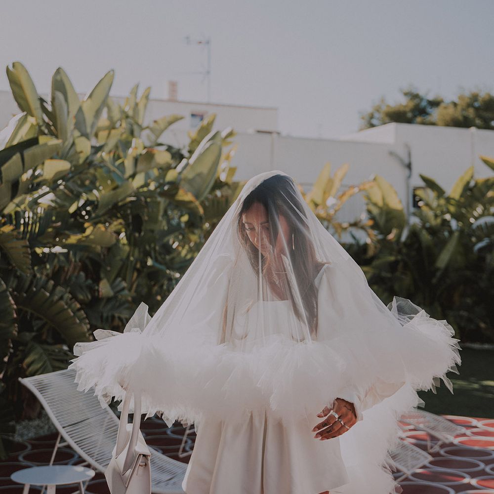 bride-wearing-ruffle-wedding-veil