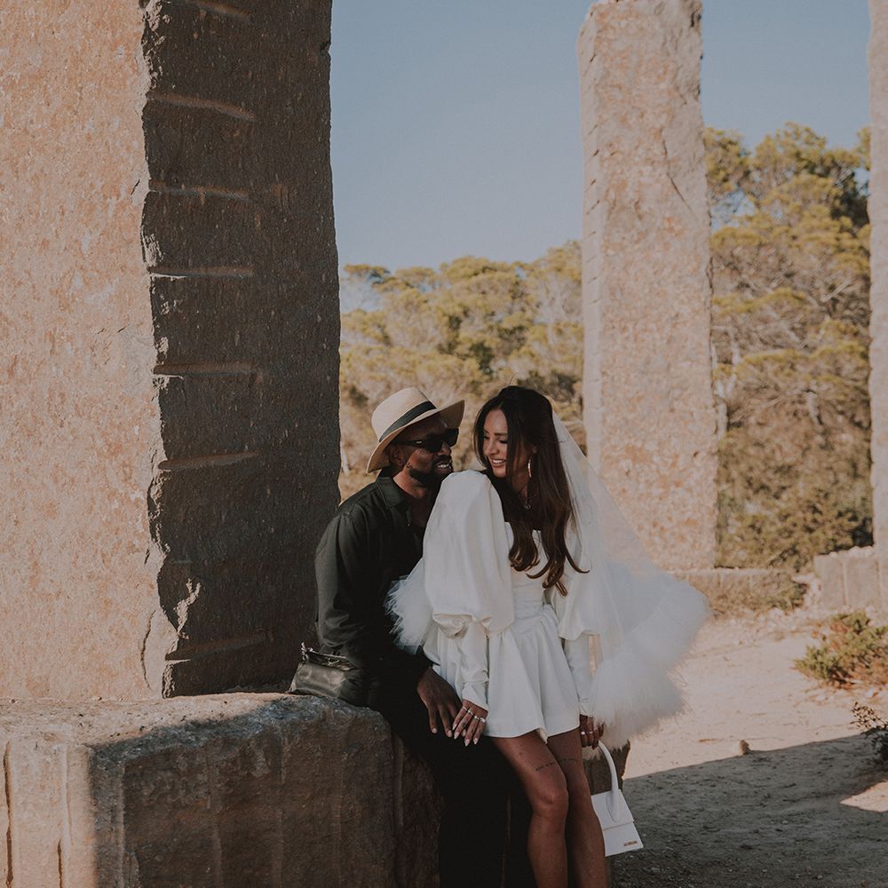bride-wearing-white-jacquemus-bag-and-louboutin-shoes