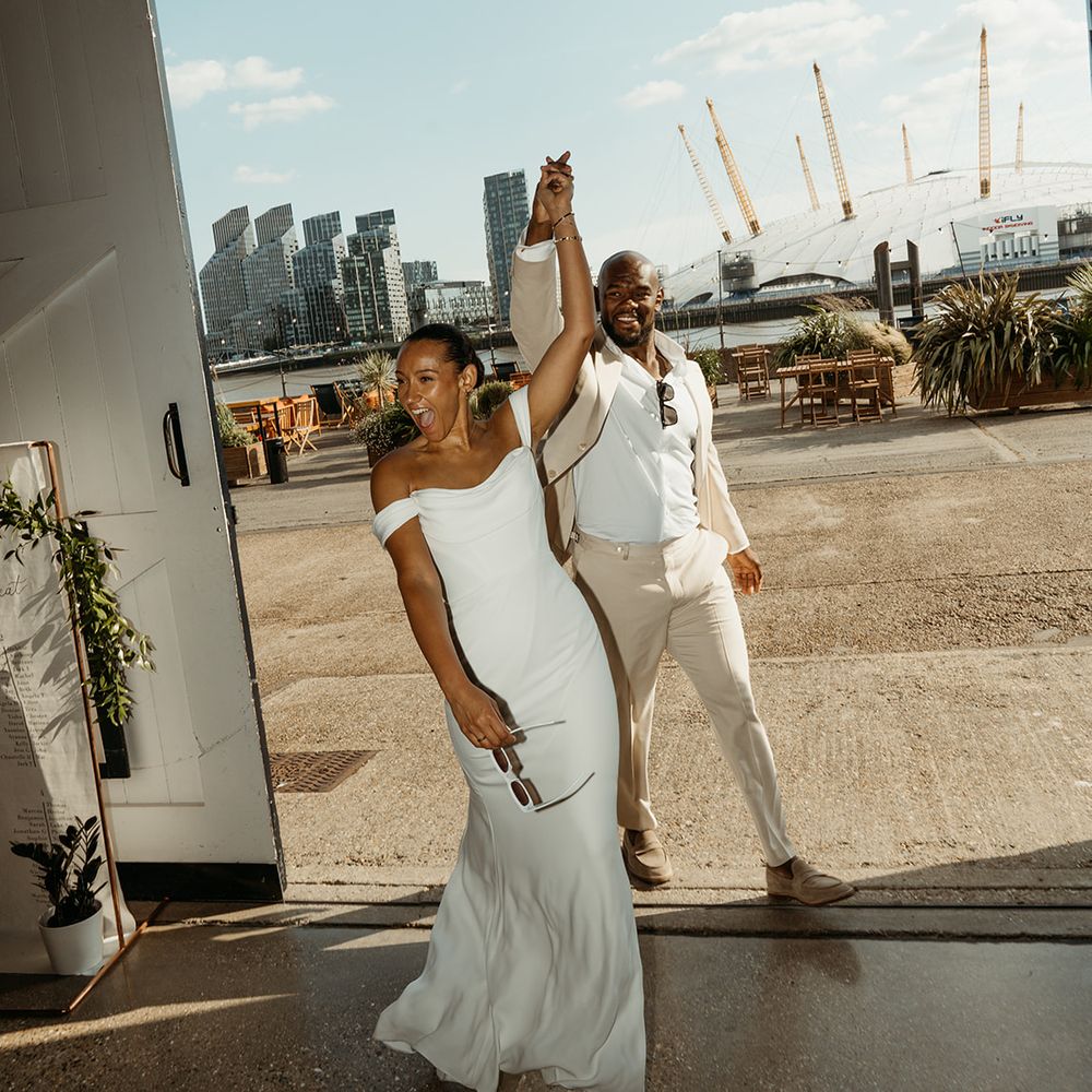 bride-and-groom-make-entrance-into-wedding-breakfast