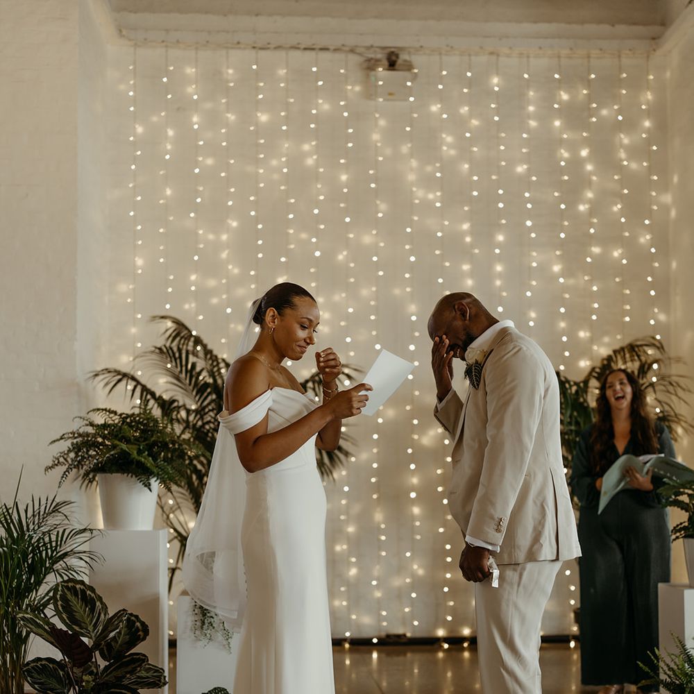 bride-reads-wedding-vows-as-groom-gets-emotional