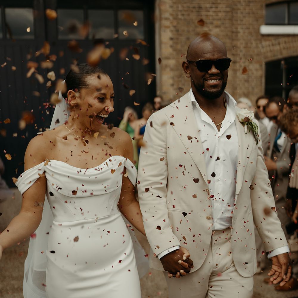 martina-liana-wedding-dress-and-groom-in-cream-suit-at-london-wedding